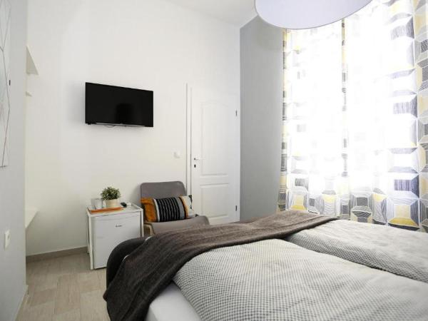 Guesthouse Villa Maggie : photo 7 de la chambre chambre standard lit queen-size