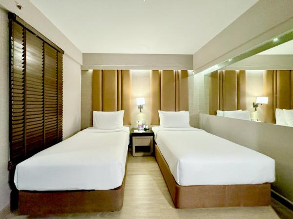 Ramada by Wyndham Bangkok Sukhumvit 11 : photo 2 de la chambre chambre premier avec 2 lits simples sans fenêtre - non-fumeurs