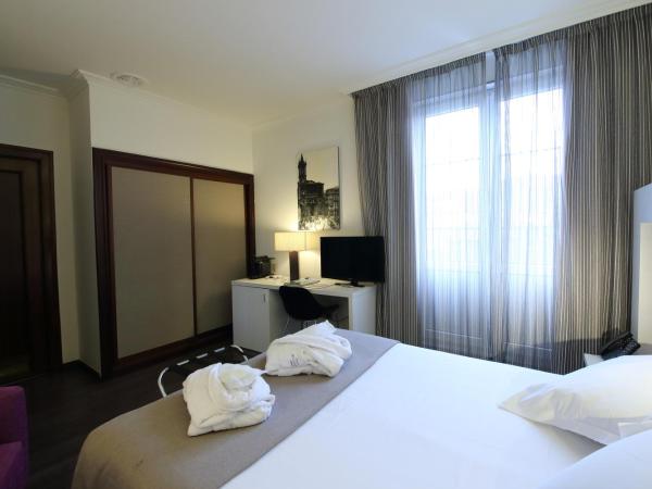 Gran Hotel España : photo 3 de la chambre chambre double ou lits jumeaux
