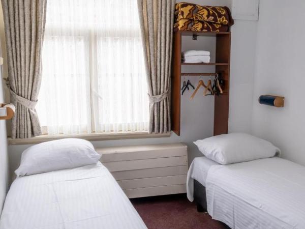 Budget Hotel Ben : photo 1 de la chambre chambre lits jumeaux