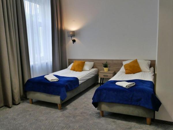 Centrum Szkoleniowo-Konferencyjne Społem : photo 1 de la chambre chambre triple