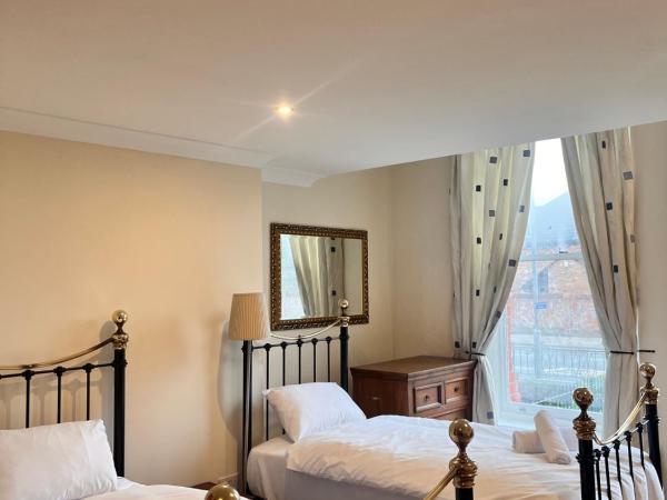Sheil Suites : photo 4 de la chambre chambre lits jumeaux