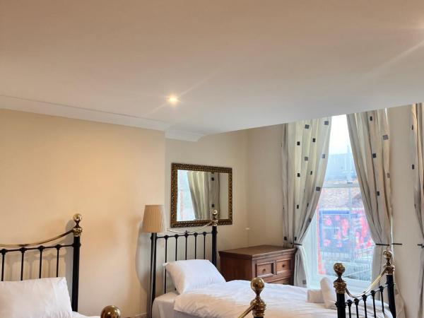 Sheil Suites : photo 8 de la chambre chambre lits jumeaux