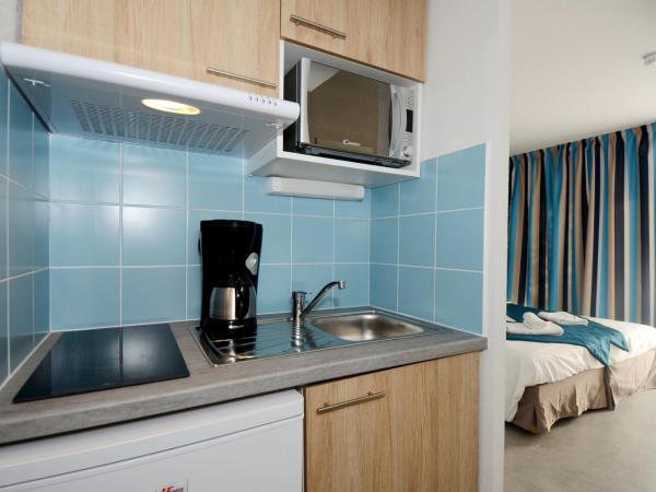 Appart'Hotel Prestige Odalys Nakâra : photo 2 de la chambre chambre double