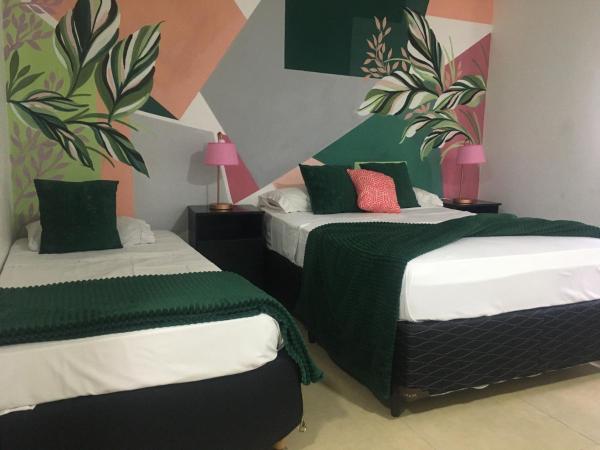 Pousada Costa Del Sol : photo 3 de la chambre chambre quadruple standard