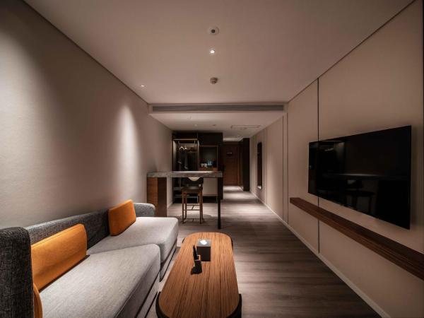 UrCove by Hyatt Shanghai Lujiazui Expo Center : photo 2 de la chambre chambre lit king-size exécutive