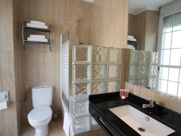 Hotel Maestranza : photo 8 de la chambre chambre double ou lits jumeaux