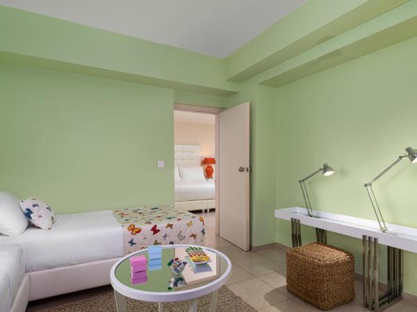 Grecotel Creta Palace : photo 5 de la chambre bungalow familial deluxe - vue sur jardin - rez-de-chaussée