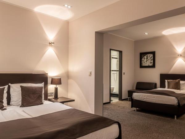 Mauritius Hotel & Therme : photo 4 de la chambre chambre quadruple