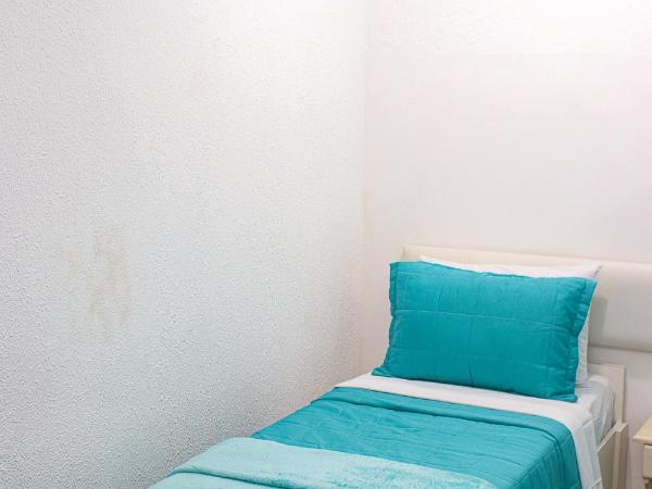 pousada da sarafina ltda : photo 10 de la chambre chambre triple