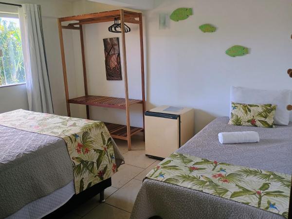 Namorada Brava Guest House : photo 4 de la chambre chambre triple - vue sur jardin