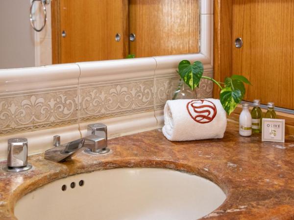 Suites Sevilla : photo 5 de la chambre chambre lit queen-size deluxe