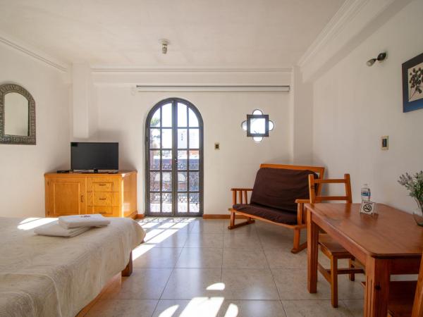 Suites Sevilla : photo 7 de la chambre chambre lit queen-size deluxe