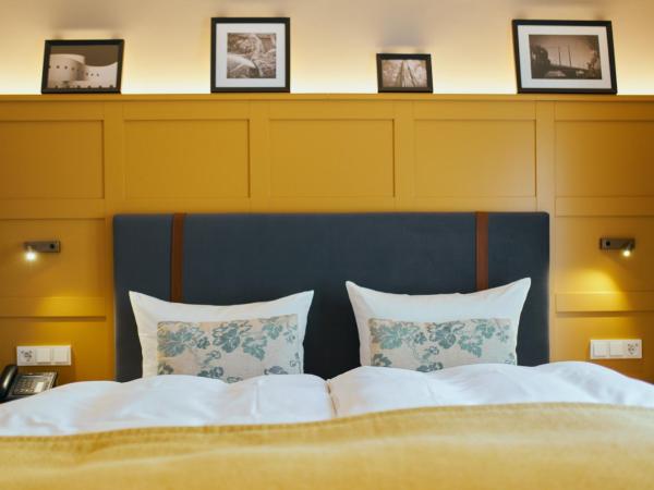 Boutique Hotel Orangerie : photo 4 de la chambre chambre supérieure avec lit king-size et vue sur la cour