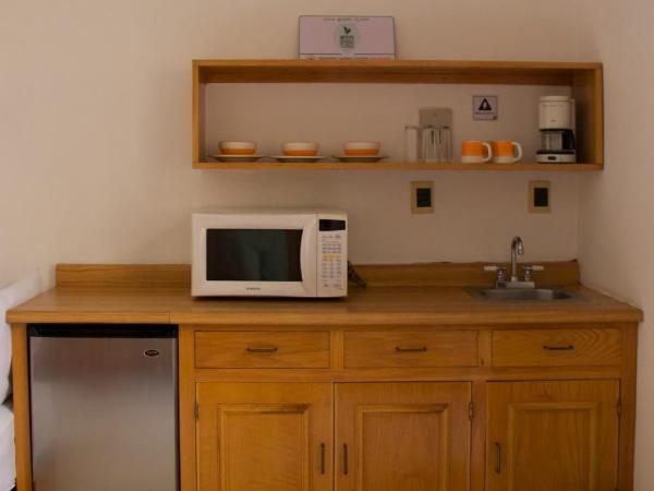 Suites Sevilla : photo 5 de la chambre chambre double avec 2 lits doubles