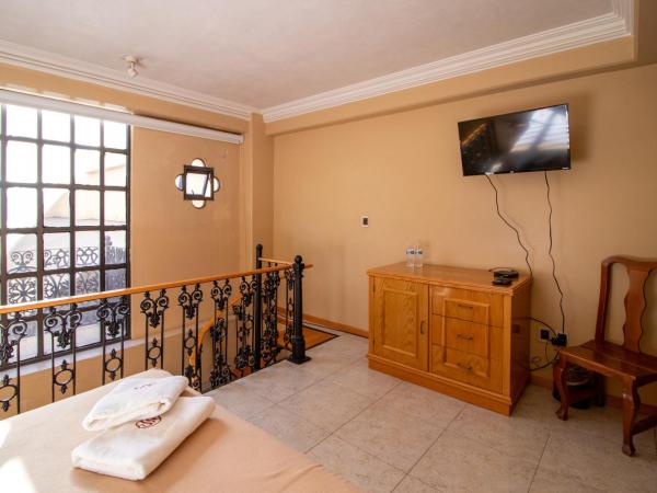 Suites Sevilla : photo 8 de la chambre chambre quadruple en duplex