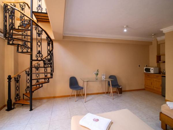 Suites Sevilla : photo 9 de la chambre chambre quadruple en duplex