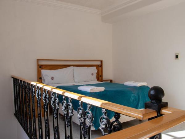 Suites Sevilla : photo 3 de la chambre chambre lit queen-size deluxe