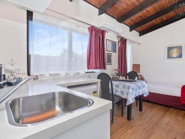 Grange Motel : photo 2 de la chambre chambre standard lit queen-size