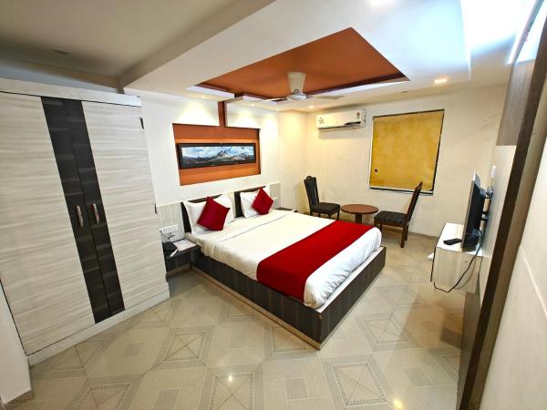 Hotel Sadbhav : photo 3 de la chambre chambre deluxe