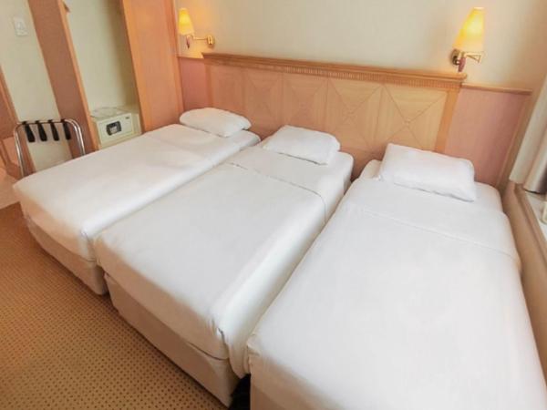 Ramada Hong Kong Grand View : photo 4 de la chambre chambre triple