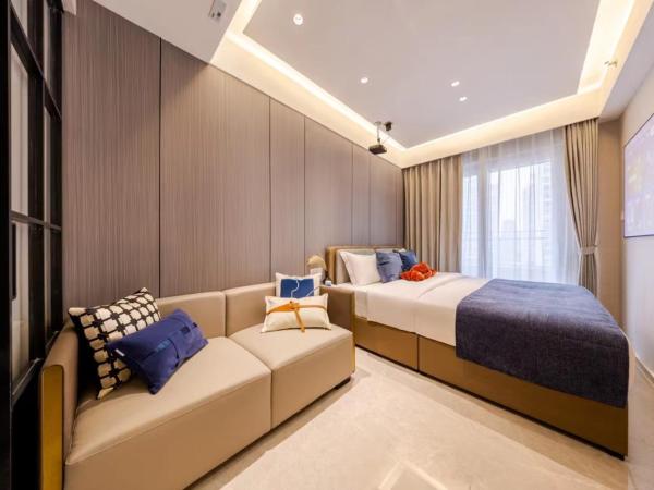 Excellence International Apartment - Convention & Exhibition Center : photo 1 de la chambre chambre lit queen-size deluxe