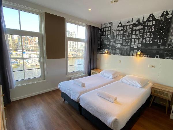 Hotel Old Quarter : photo 6 de la chambre chambre double ou lits jumeaux - vue sur canal