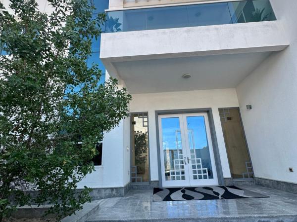 Centerpoint Duplex Villa : photo 4 de la chambre chambre double - vue sur jardin