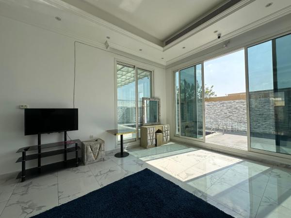 Centerpoint Duplex Villa : photo 9 de la chambre chambre double - vue sur jardin