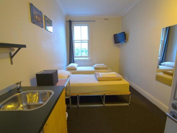 Cambridge Lodge : photo 3 de la chambre chambre lits jumeaux avec salle de bains commune