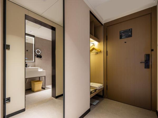 Atour X Hotel Guangzhou Huangpu Nangang Wanda : photo 6 de la chambre jimu suite with city view