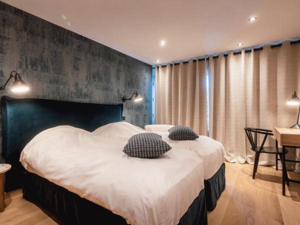 Hotel Les Mélèzes : photo 2 de la chambre chambre lits jumeaux avec baignoire - traditionnelle
