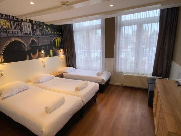 Hotel Old Quarter : photo 1 de la chambre chambre triple - vue sur canal