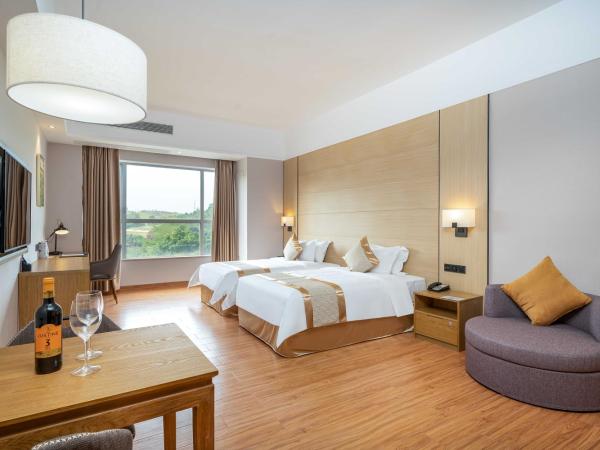 Phoenix Hill Hotel Dongguan - Golf Course Shop : photo 3 de la chambre chambre lits jumeaux deluxe