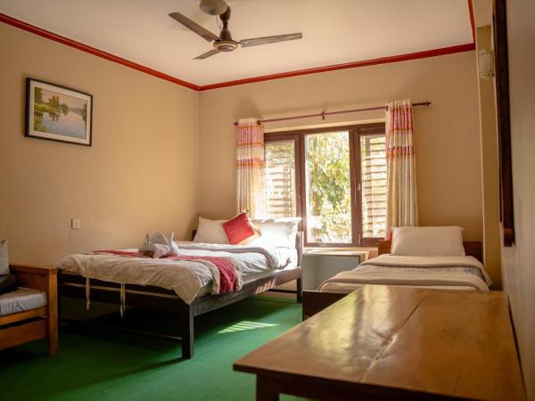 Nepali Cottage Guest House : photo 10 de la chambre chambre deluxe double ou lits jumeaux