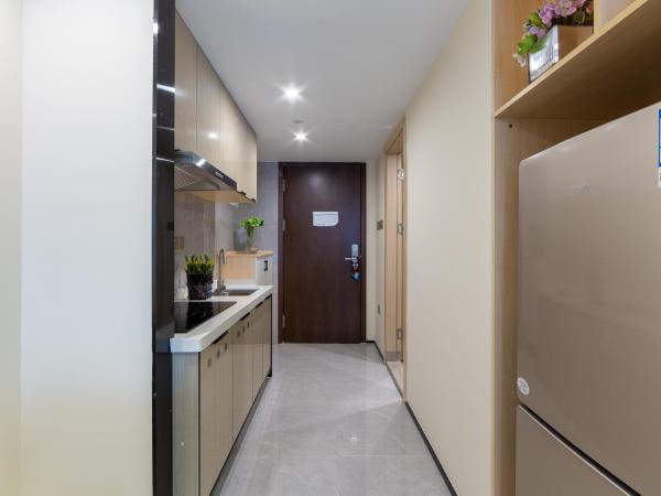 Serveyou International Apartment - Free Airport Pickup Service & Free Canton Fair Shuttle Bus : photo 3 de la chambre suite deluxe 1 chambre