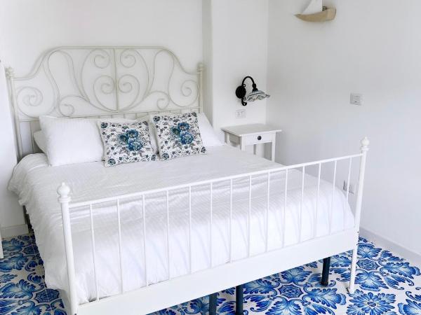 Suite Villa Carolina : photo 6 de la chambre chambre double - vue sur jardin