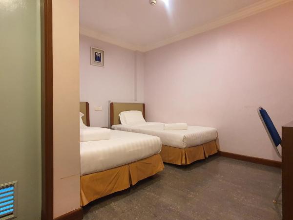 Capital O 90939 Sandakan Central Hotel : photo 3 de la chambre chambre lits jumeaux standard