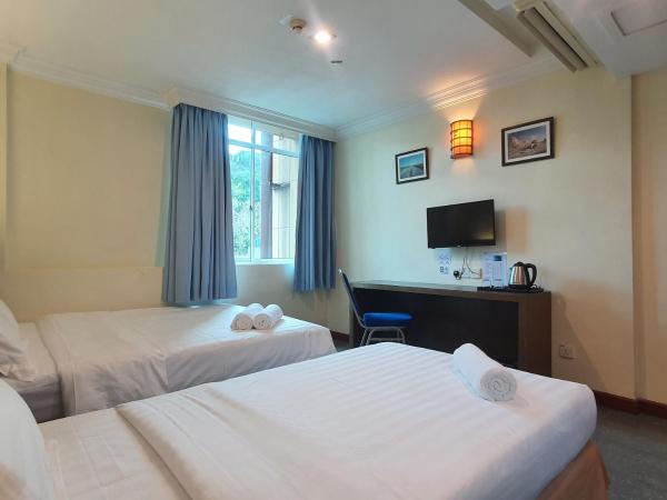 Capital O 90939 Sandakan Central Hotel : photo 2 de la chambre suite familiale