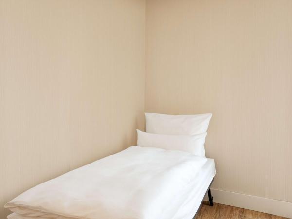 NH Amsterdam Schiller : photo 6 de la chambre chambre double ou lits jumeaux supérieure avec lit d'appoint (2 adultes + 1 enfant)