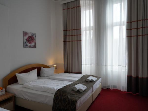 City Pension Berlin : photo 5 de la chambre chambre triple