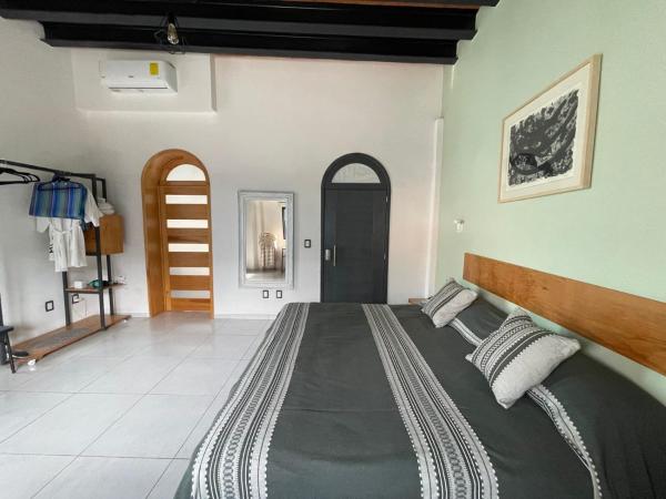 LARIMAR Gallery y Hotel Boutique : photo 4 de la chambre chambre lit king-size supérieure