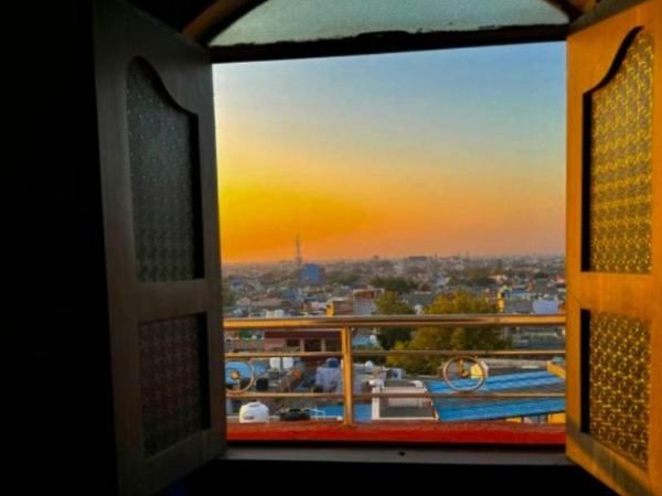 Inda Heritage Guest House : photo 2 de la chambre chambre lit king-size - vue sur montagne