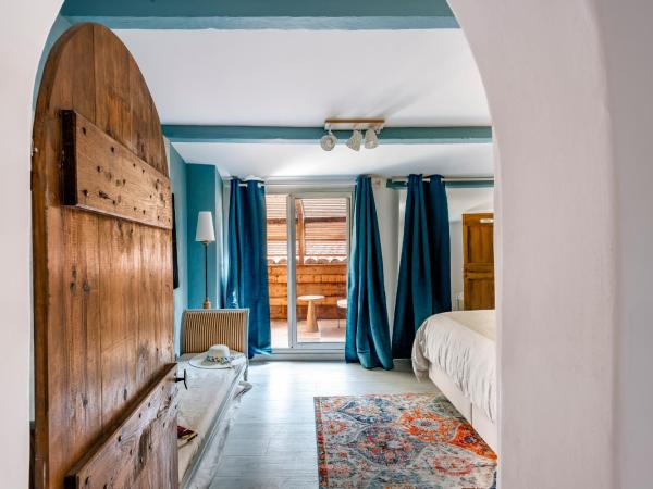 Aux Heures Bleues : photo 6 de la chambre chambre double deluxe avec baignoire