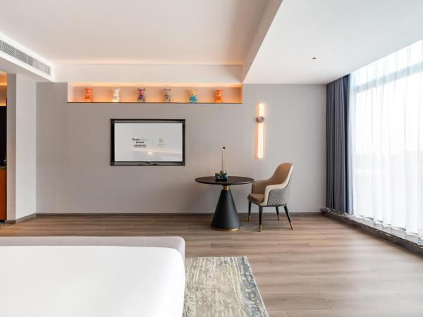 The Puyan Hotel Hangzhou Jiubao : photo 2 de la chambre chambre lit king-size deluxe