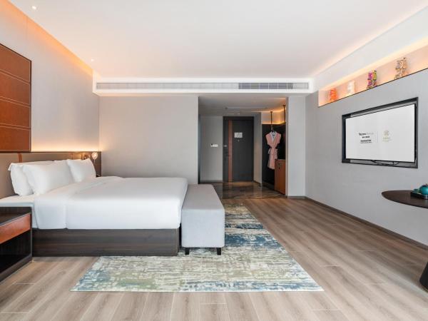 The Puyan Hotel Hangzhou Jiubao : photo 4 de la chambre chambre lit king-size deluxe