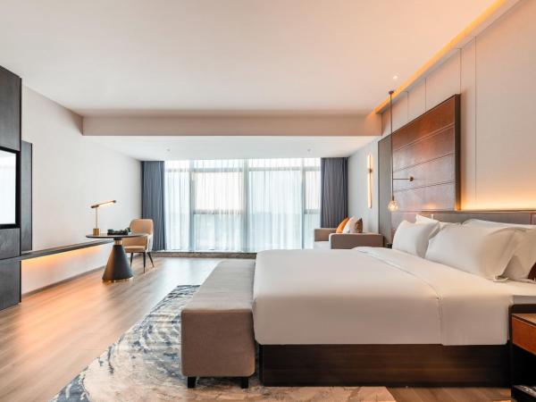 The Puyan Hotel Hangzhou Jiubao : photo 3 de la chambre chambre lit king-size premium