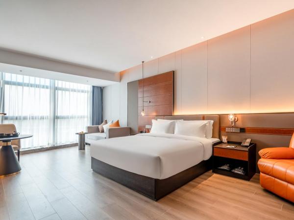 The Puyan Hotel Hangzhou Jiubao : photo 1 de la chambre grande chambre lit king-size