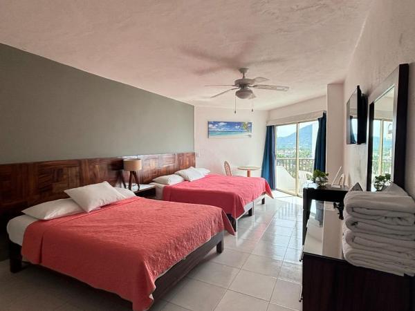 ENNA INN IXTAPA HABITACIóN VISTA AL MAR : photo 3 de la chambre chambre quadruple