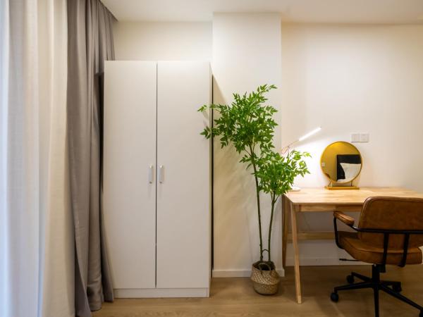 Cloud Expo Apartment : photo 4 de la chambre chambre lits jumeaux deluxe